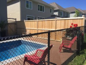new red cedar fence with chain link fence installed