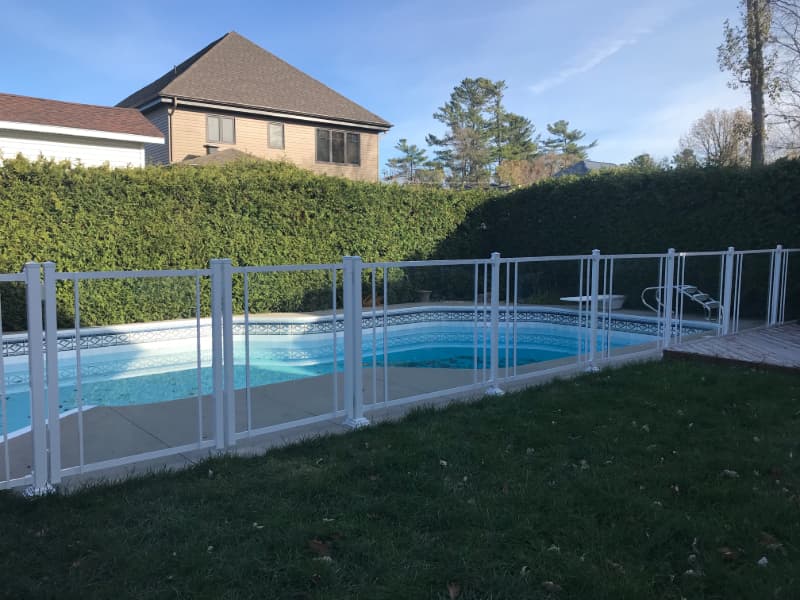 glass fence surrounding pool